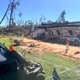 Illustration for article titled How a Florida Jeep Club Used Wranglers to Flip a Familys House Over After Hurricane Michael